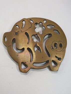 vintage cast iron light copper pig trivet